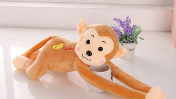 Pair of Orangish brown 30cm monkey curtain soft toy style tie back